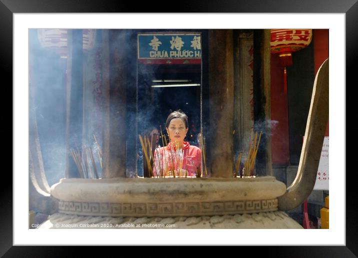 Ho Chi Ming, Vietnam - 27 October 2011: Asian religious people praying in Vietnam temple Framed Mounted Print by Joaquin Corbalan