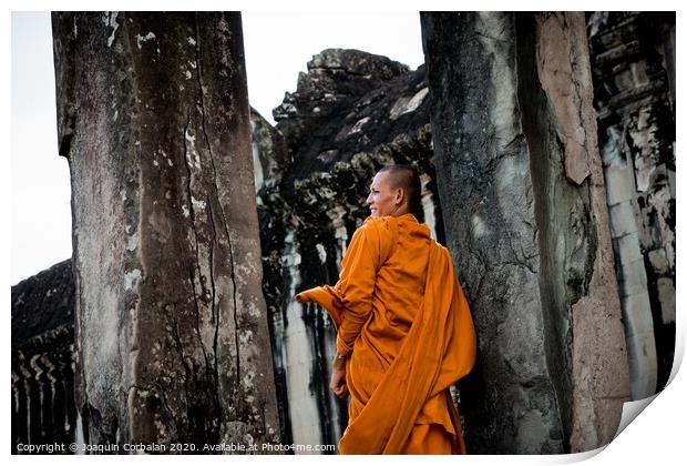 Khsach Kandal, Cambodia - 28 October 2011: Tibetan monks in orange robes visiting remote Cambodian temples to meditate. Print by Joaquin Corbalan