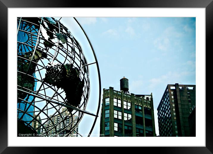 New York, USA - October 5, 2018: Sculpture on Columbus Circle with view of water reservoirs of nearby buildings. Framed Mounted Print by Joaquin Corbalan