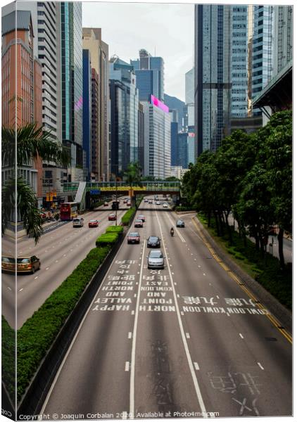  One of the main roads of the Chinese city with light traffic. Canvas Print by Joaquin Corbalan