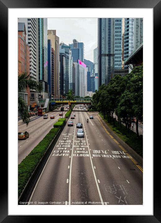  One of the main roads of the Chinese city with light traffic. Framed Mounted Print by Joaquin Corbalan