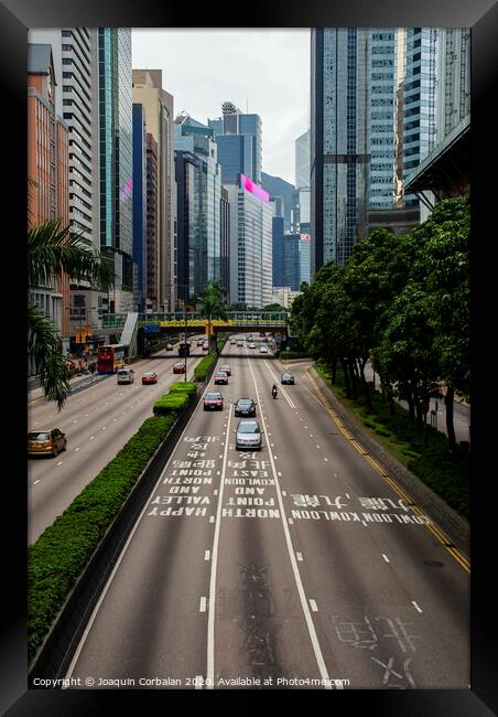  One of the main roads of the Chinese city with light traffic. Framed Print by Joaquin Corbalan