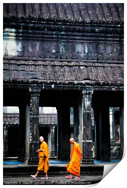 Buddhist monks meditating while walking through the Angkor Thom temple Print by Joaquin Corbalan