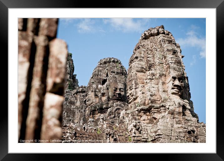 Ruins of ancient temples around the religious complex of Angkor Thom Framed Mounted Print by Joaquin Corbalan