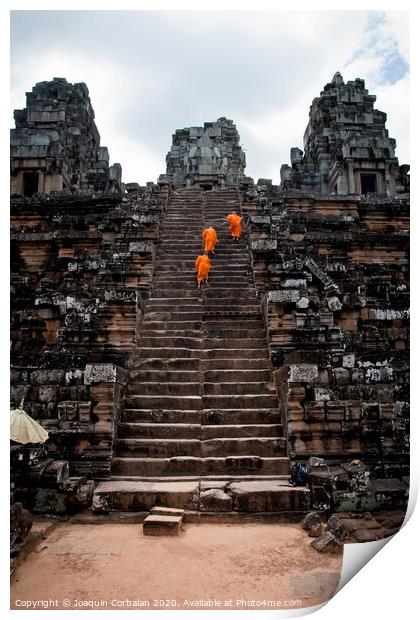 Buddhist monks meditating while walking through the Angkor Thom temple Print by Joaquin Corbalan