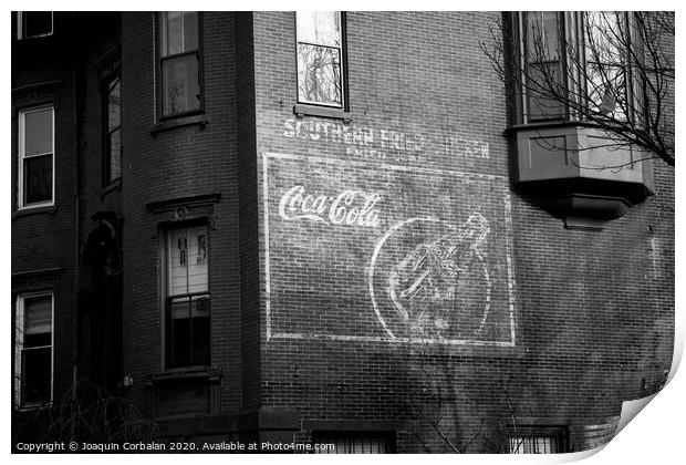 Old advertising poster of soda drink on the brick walls of a building. Print by Joaquin Corbalan