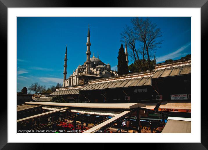 Istanbul, Turkey -  Panoramic view of the city of Istanbul at sunset, highlighting the minarets of its mosques. Framed Mounted Print by Joaquin Corbalan