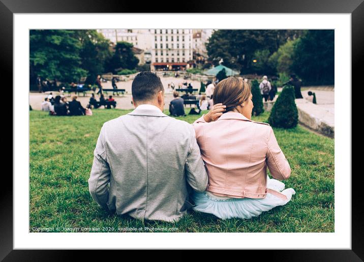 Just married couple in the Eiffel tower on wedding day. Walking an kissing in Paris Framed Mounted Print by Joaquin Corbalan