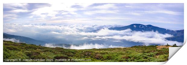 Panoramic image of the views of the Sierra de Guadarrama with its clouds from the top of a mountain peak. Print by Joaquin Corbalan