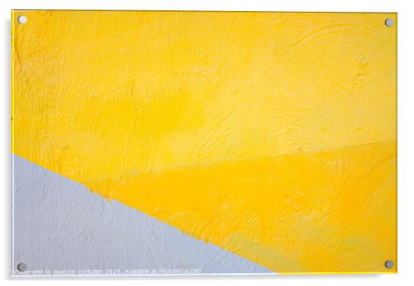 A wall painted with lines of various colors, yellow and orange tones. Acrylic by Joaquin Corbalan