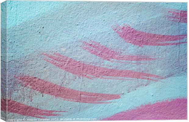 Pink brush strokes on blue painted wall. Canvas Print by Joaquin Corbalan
