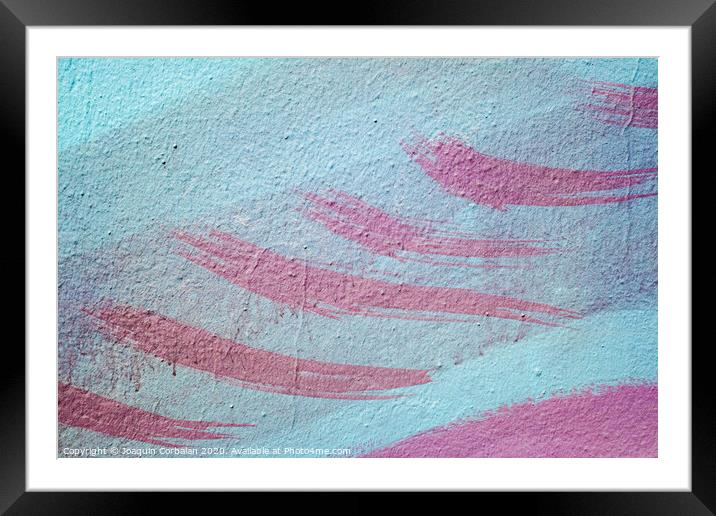 Pink brush strokes on blue painted wall. Framed Mounted Print by Joaquin Corbalan