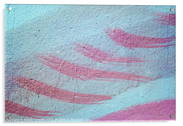 Pink brush strokes on blue painted wall. Acrylic by Joaquin Corbalan