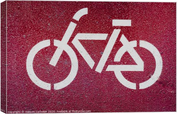 Symbol of a bicycle indicating a bike lane to pedal safely. Canvas Print by Joaquin Corbalan