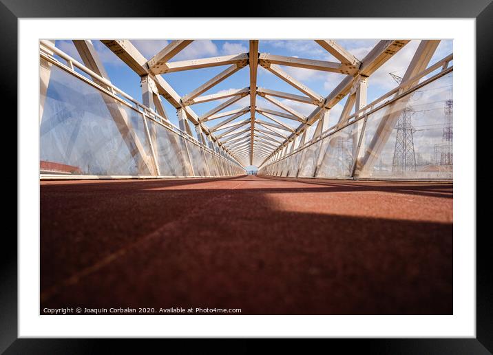 Pedestrian bridge with modern geometric shapes in futuristic style. Framed Mounted Print by Joaquin Corbalan