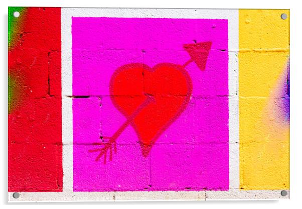 Heart pierced by a red arrow painted on a framed mural. Acrylic by Joaquin Corbalan