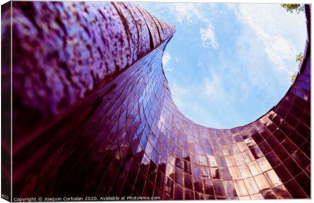 Spiral construction of tiles, with blue reflections of the sky, modernist background. Canvas Print by Joaquin Corbalan