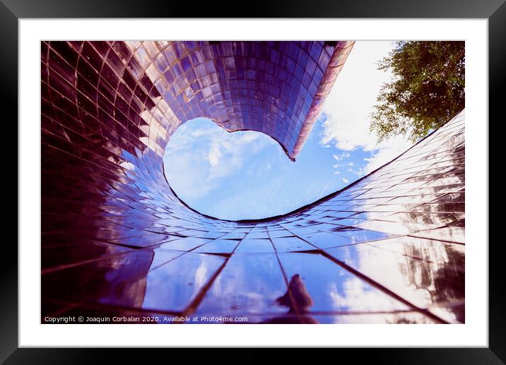 Spiral construction of tiles, with blue reflections of the sky, modernist background. Framed Mounted Print by Joaquin Corbalan