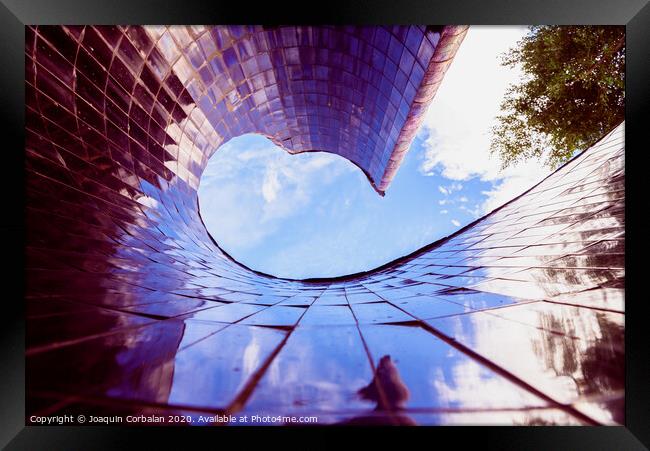 Spiral construction of tiles, with blue reflections of the sky, modernist background. Framed Print by Joaquin Corbalan