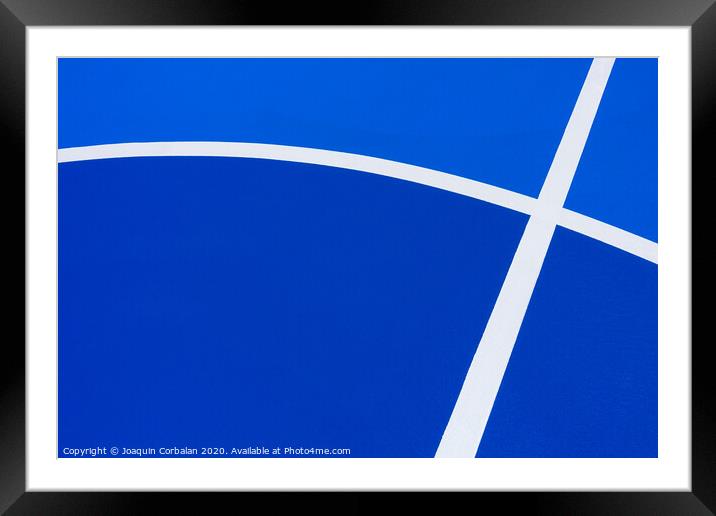 Background with cement texture painted blue, with white curved lines of a minimalist pattern with copy space. Framed Mounted Print by Joaquin Corbalan