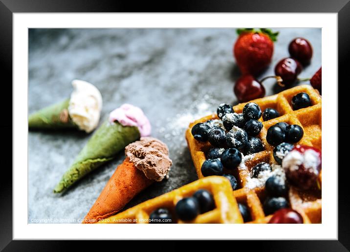 Ice creams and waffles with tasty red fruits full of healthy vitamins, over dark stone background with copy space for text. Framed Mounted Print by Joaquin Corbalan