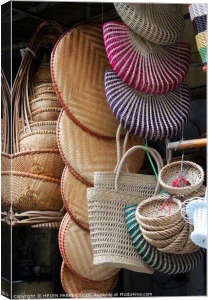 Hanoi market baskets Canvas Print by HELEN PARKER