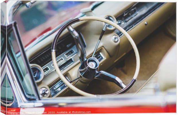 Valencia, Spain - July 21, 2012: Dashboard and steering wheel of a luxury vintage car, an American Mustang. Canvas Print by Joaquin Corbalan