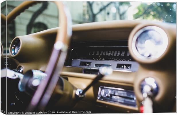 Valencia, Spain - July 21, 2012: Dashboard and steering wheel of a luxury vintage car, an American Mustang. Canvas Print by Joaquin Corbalan