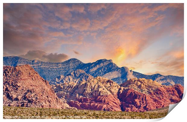Red Rock and Blue Mountains Rising from Desert at Sunset Print by Darryl Brooks