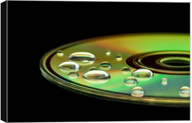 CD with water droplets Canvas Print by Beata Aldridge
