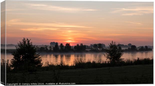 sunrise over the river maas in Holland Canvas Print by Chris Willemsen