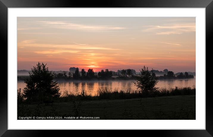 sunrise over the river maas in Holland Framed Mounted Print by Chris Willemsen