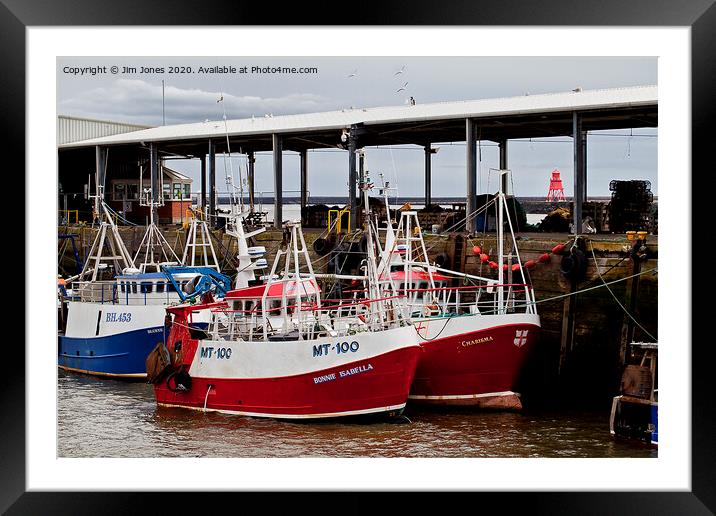 Fishing Boats safely tied up in harbour Framed Mounted Print by Jim Jones