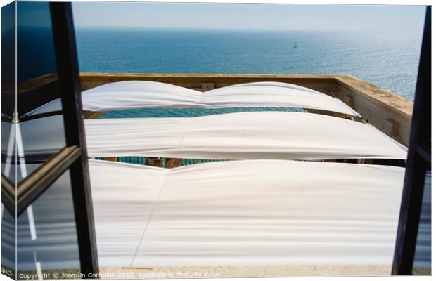 Serene sea seen from the window of a summer residence in the Mediterranean. Canvas Print by Joaquin Corbalan