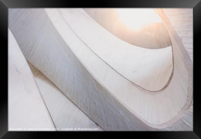 Architectural background with curved lines of warm tones and light and white color. Framed Print by Joaquin Corbalan