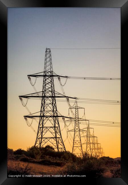 Electricity Pylons at Sunset Framed Print by Heidi Stewart