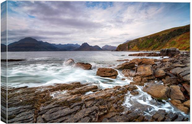 Moody skies over the beach at Elgol  Canvas Print by Helen Hotson