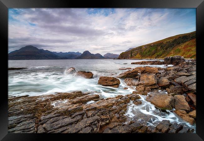 Moody skies over the beach at Elgol  Framed Print by Helen Hotson