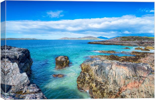 The beautiful rocky coastline at Traigh Seilebost  Canvas Print by Helen Hotson