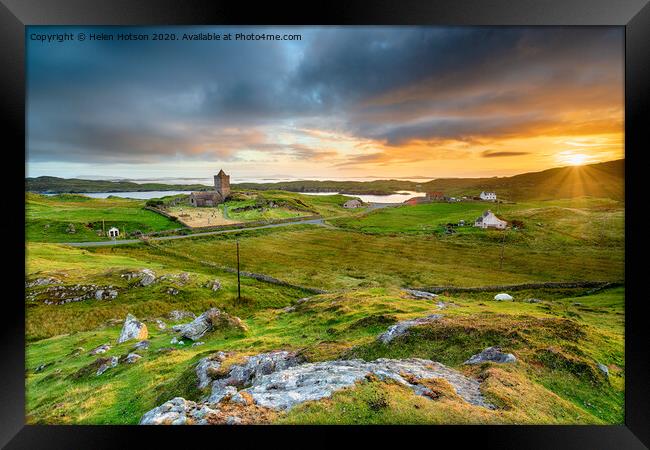 Beautiful sunset over the village of Rodel on the Isle of Harris  Framed Print by Helen Hotson