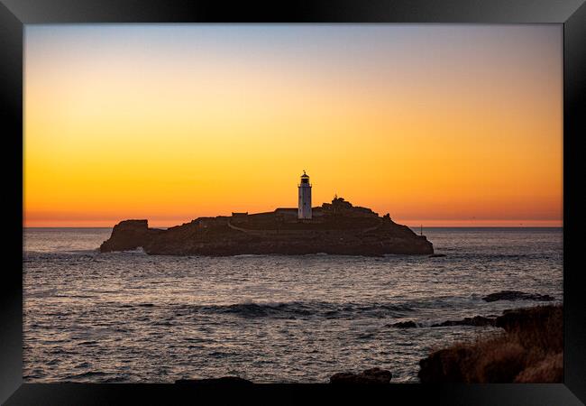 Godrevy Lighthuse at Sunset Framed Print by Ian Whitcombe
