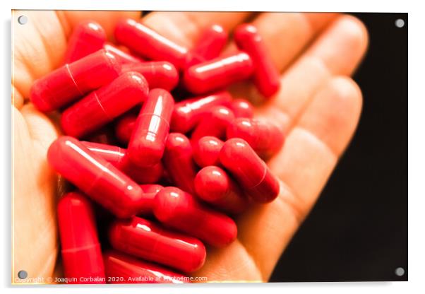 Man's hand holding a handful of medicine pills, to treat addictive diseases Acrylic by Joaquin Corbalan
