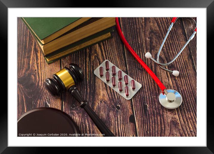 Gavel as a symbol of medical justice, applied by doctor judges. Framed Mounted Print by Joaquin Corbalan