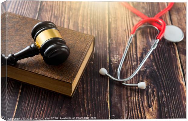 Gavel as a symbol of medical justice, applied by doctor judges, trend in 2020. Canvas Print by Joaquin Corbalan