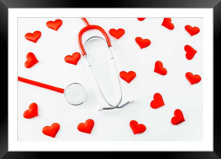 Stethoscope isolated on white background with red hearts. Framed Mounted Print by Joaquin Corbalan
