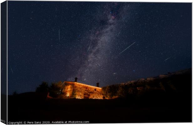 Perseid Meteor Shower over a Rural House Canvas Print by Pere Sanz