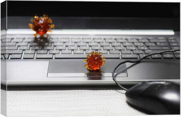coronavirus covid-19 on a keyboard of a laptop pc Canvas Print by Alessandro Della Torre