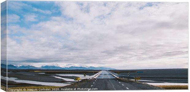 Icelandic lonely road in wild territory with no one in sight Canvas Print by Joaquin Corbalan