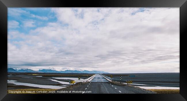 Icelandic lonely road in wild territory with no one in sight Framed Print by Joaquin Corbalan