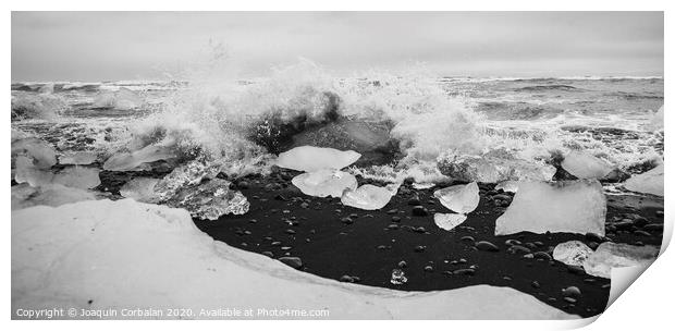 Giant ice blocks detached from icebergs on the coast of an Icelandic beach. Print by Joaquin Corbalan